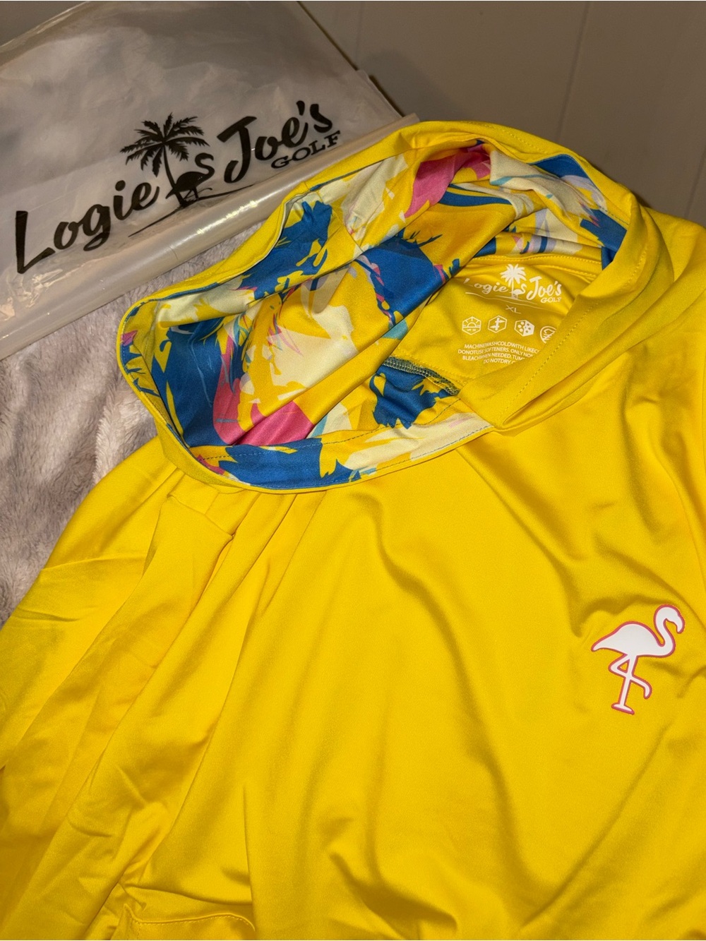 Logie Joe's Yellow Performance Hoodie with Blue, pink, and yellow hood lining